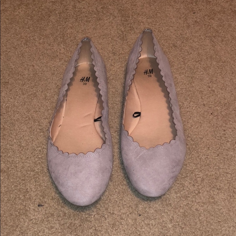 Light grey close toed slip on shoes